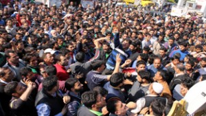 Stranded passengers from Kashmir staging protest at Jammu Bus Stand on Wednesday.   -Excelsior/ Rakesh 