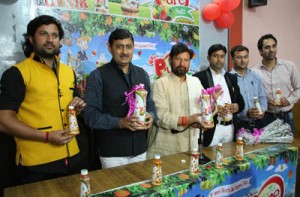Health Minister, Choudhary Lal Singh along with others unveiling range of ‘Drink Pure Fruit’ juices at Press Club, Jammu on Sunday.