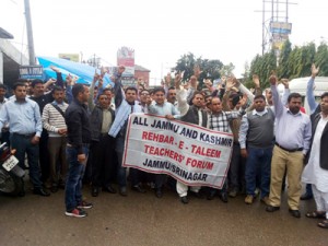 ReT Teachers raising slogans in support of their demands on Sunday.