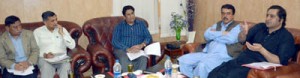 Minister for Animal Husbandry Sajad Lone chairing a meeting at Jammu on Saturday.