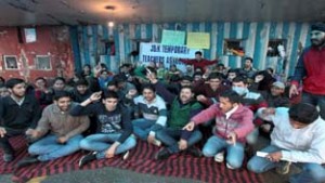 Temporary teachers raising slogans during hunger strike at Jammu on Monday. -Excelsior/Rakesh