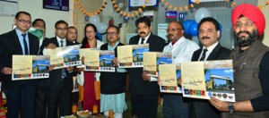 DyCM Dr Nirmal Singh launching application forms for allotment of plots at Bankers Enclave.