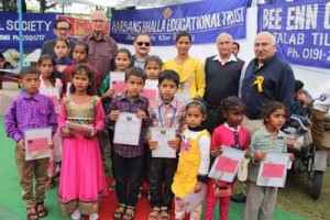 Beneficiaries posing for group photograph.