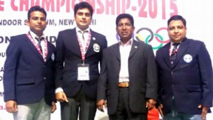 Karatekas Umesh Rekhi and Rinku Sharma posing along with Mr Pillay, president South Africa Karate Federation and  Ambedkar Gupta, president AKAJK.