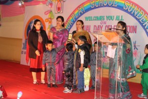 Prizes being distributed among the students by the dignitaries at Ankur Play School in Sunderbani.