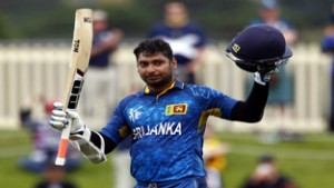 Sri Lanka's Kumar Sangakkara acknowledges his century during the Cricket World Cup match against Scotland in Hobart on Wednesday. (UNI)