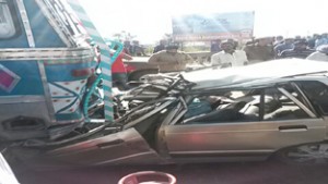 A totally damaged car which was hit by a truck at Bari-Brahmana on Jammu-Pathankote NH on Tuesday. - Excelsior / Gautam