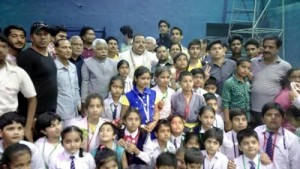 Winners posing for a group photograph alongwith dignitaries during concluding function of 17th State Open Judo Championship at MA Stadium in Jammu.