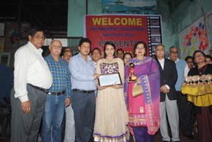 Meritorious students being felicitated during annual day celebration at Environment Educational Institute in Jammu.