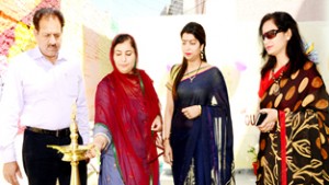 Dignitaries lighting the ceremonial lamp during Founder’s Day celebration at Crescent  Public School.