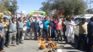 NPP activists raising slogans during protest at Udhampur.