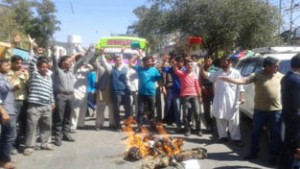 NPP activists raising slogans during protest at Udhampur.