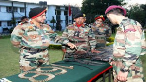 Army Commander Western Command being briefed on the recoveries made from the slain terrorists.