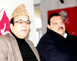 Senior NC leaders A R Rather and Devender Rana addressing a press conference at Jammu on Monday. -Excelsior/Rakesh