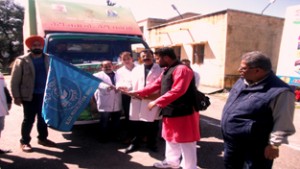 Tehsildar Jindrah Subash Chander, Mohd Rashid Naib Tehsildar Jajjar Kotli, CDPO Punita Bhagat  while flagging off the publicity vehicle on Thursday.