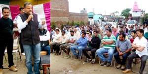 Ex-MLA Ashwani Kumar addressing people during a meeting in Arnia on Sunday.