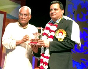 Son of the soil, Shailender Singh receiving Sahitya Akademy Award from veteran literary personality, Gurdial Singh at New Delhi.