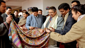 Chief Executive Officer Dr M.K Bhandari being briefed about a product during Handloom Expo on Monday.