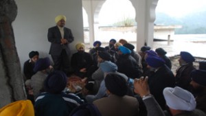 SGPB chairman and ex-MLC, Tarlochan Singh Wazir, addressing Sikh Sangat at a Gurdwara in tehsil Nowshera of Rajouri district.
