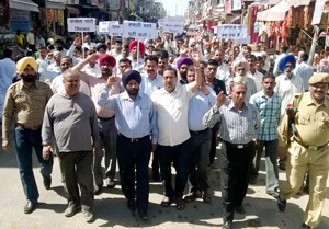Former Minister and Senior Congress leader, Manjit Singh leading the people during a protest at Vijaypur on Wednesday.