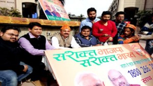 BJP senior leader Yudhvir Sethi along with BJYM leaders at a membership camp at Jammu on Wednesday.