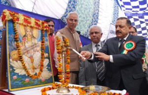 Union Minister in PMO, Dr Jitendra Singh lighting a traditional lamp at a function at KP Sabha at Jammu on Saturday. -Excelsior/ Rakesh