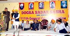 MP Dr Karan Singh expressing his views during 111th Annual General Council of DSS at Jammu on Sunday.