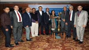 Officials of Apollo Hospital during a function at Jammu on Friday.