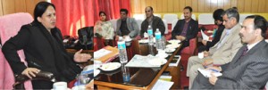 Minister of State for Social Welfare & Health Asiya Naqash chairing a meeting at Jammu on Friday. 