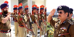 DIG Shakeel Ahmed Beig taking salute at a march past. 