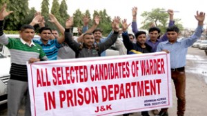 Selected candidates of warder in Prison Department raising slogans during protest at Jammu on Monday. — Excelsior/Rakesh
