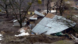 Collapsed houses in Baramulla village. -Excelsior/Aabid Nabi