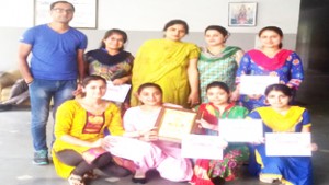 Students of KC Gurukul School, who excelled in ‘Lok Rang Mahotsava’ posing for a group photograph.