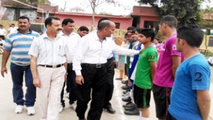  DYSSO Jammu, Sukhdev Raj Sharma interacting with the players while inaugurating Inter-School Tournament at Jourian on Tuesday.
