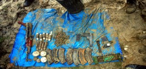 Arms and ammunition recovered by Army in Pattan, Baramulla on Sunday. -Excelsior/Aabid Nabi