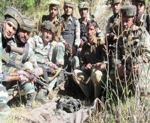 Troops pose with seizure at Kalaban forests in Reasi district on Saturday.