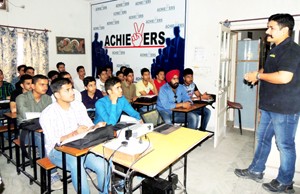 Speaker being keenly listened by the participants during a workshop on 'Career in Defence'.  