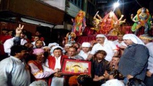 Minister of Health, Lal Singh, MLC Ashok Khajuria, Rajesh Gupta MLA in a religious function on Sunday.