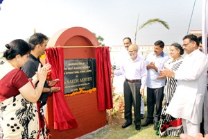 Minister for Education, Naeem Akhter and other dignitaries unveiling Foundation Stone at Doon International School in Jammu. 