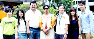 Aryans delegation posing for a group photograph with the members of National University of Singapore.