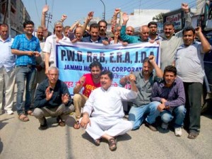 Activists of Jammu West Assembly Movement holding protest in support of their demands on Monday.