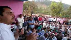 MLA Ramnagar addressing people at Chowki on Sunday.
