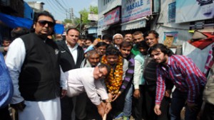 MLA Jammu East Rajesh Gupta starting laying of water pipes in Bori Basti on Friday.