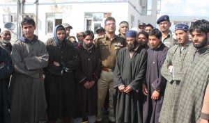 Youths arrested by police before joining militancy at Shopian on Wednesday. -Excelsior/ Younis Khaliq