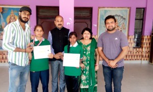 Medal winners in Wushu posing for a group photograph during felicitation function at Bharti Public School.