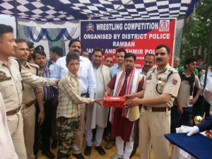 Young wrestlers being felicitated by the chief guest and other dignitaries during wrestling competition at Ramban.