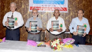 Minister for Education, Naeem Akhtar & others releasing Pensioners’ Journal and Members Directory at Jammu Club on Saturday. 