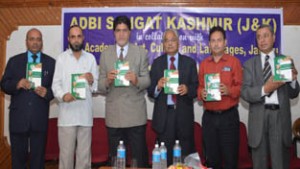 Minister of State for Transport, AG Kohli, alongwith other distinguished guests releasing a book on Gujjars at KL Saigal Hall, Jammu on Wednesday.