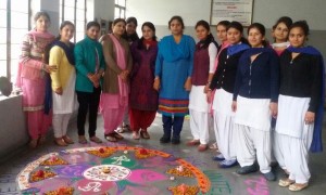 Participants of Rangoli competition posing for a group             photograph at KC Gurukul College of Education in Jammu.