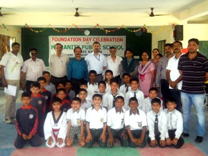 Players posing along with officials at Humanity Public High School, Bari Brahmana in Samba. 